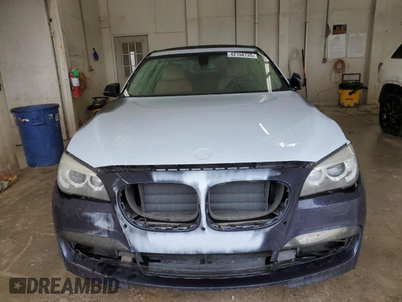 2014 BMW 7 Series 740Li with VIN WBAYE4C50ED138606, listed as a Copart auction lot 42158725 with 166,402 mi miles and Salvage Title. Bid and sale history available at carsss.com. Image 5.