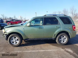 2008 Ford Escape Hybrid with VIN 1FMCU49H78KA72262, listed as a IAAI auction lot 41747610 with 145,588 mi miles. Bid and sale history available at carsss.com. Image 14.