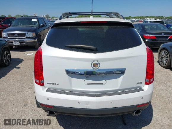 2014 Cadillac SRX Performance Collection with VIN 3GYFNFE35ES582897, listed as a IAAI auction lot 41978361 with 144,116 mi miles and . Bid and sale history available at DreamBid. Image 16.