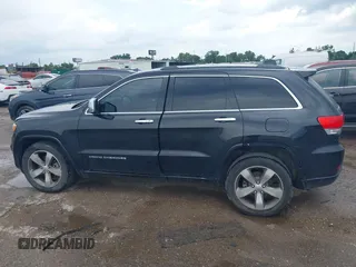 2015 Jeep Grand Cherokee Overland with VIN 1C4RJECG1FC769950, listed as a IAAI auction lot 42405712 with 217,514 mi miles and . Bid and sale history available at DreamBid. Image 14.