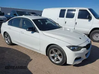 2014 BMW 3 Series 328i xDrive with VIN WBA3B3C56EJ981496, listed as a IAAI auction lot 41822862 with 137,700 mi miles. Bid and sale history available at carsss.com. Image 1.