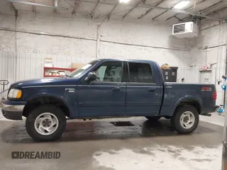 2003 Ford F-150 XLT z VIN 1FTRW08L73KC11631, wystawiony jako IAAI lot #42673130 z przebiegiem 188 945 mil mil oraz . Historia ofert i sprzedaży dostępna na DreamBid. Obrazek 14.