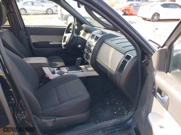 2009 Mercury Mariner Premier with VIN 4M2CU87G39KJ22933, listed as a IAAI auction lot 41780392 with 126,972 mi miles. Bid and sale history available at carsss.com. Image 5.