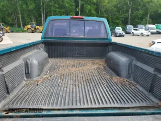 1997 Nissan Frontier XE with VIN 1N6SD11Y4VC346711, listed as a Copart auction lot 61025615 with 100,417 mi miles and Clean title. Bid and sale history available at DreamBid. Image 10.