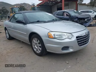 2006 Chrysler Sebring GTC z VIN 1C3EL75R46N256879, wystawiony jako IAAI lot #42071980 z przebiegiem 54 164 mil mil oraz . Historia ofert i sprzedaży dostępna na DreamBid. Obrazek 1.