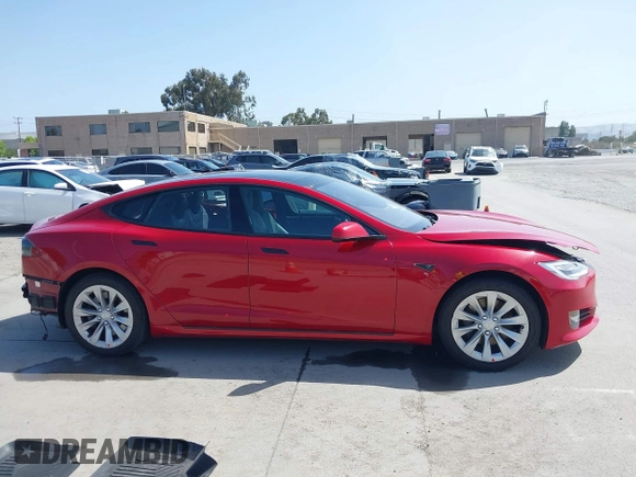 2016 Tesla Model S 70 with VIN 5YJSA1E17GF152401, listed as a IAAI auction lot 42272384 with 65,698 mi miles and . Bid and sale history available at DreamBid. Image 14.