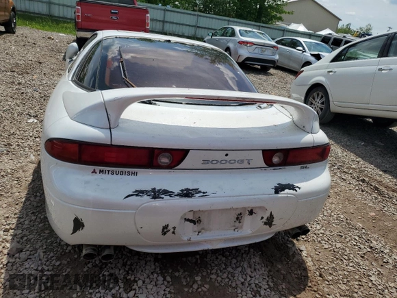 1998 Mitsubishi 3000GT GT z VIN JA3AM84J7WY003884, wystawiony jako Copart lot #59136565 z przebiegiem 274 171 mil mil oraz Tytuł czysty. Historia ofert i sprzedaży dostępna na DreamBid. Obrazek 6.