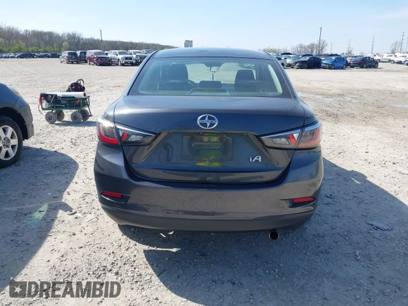 2016 Scion iA with VIN 3MYDLBZV3GY131783, listed as a IAAI auction lot 41999144 with 197,827 mi miles. Bid and sale history available at carsss.com. Image 16.