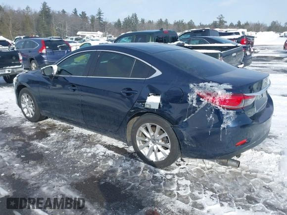 2016 Mazda 6 i Sport with VIN JM1GJ1U53G1407290, listed as a IAAI auction lot 41579668 with 131,527 mi miles and . Bid and sale history available at DreamBid. Image 3.