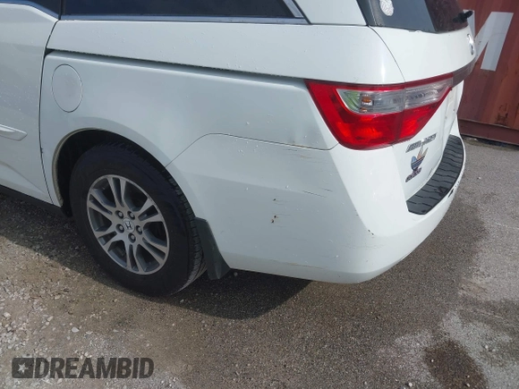 2011 Honda Odyssey EX-L with VIN 5FNRL5H60BB026171, listed as a IAAI auction lot 42511296 with 288,827 mi miles and . Bid and sale history available at DreamBid. Image 20.