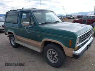 1988 Ford Bronco z VIN 1FMCU14T6JUB19012, wystawiony jako IAAI lot #42789435 z przebiegiem 71 167 mil mil oraz . Historia ofert i sprzedaży dostępna na DreamBid. Obrazek 1.