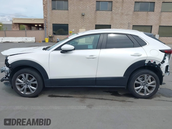 2023 Mazda CX-30 S Carbon Edition with VIN 3MVDMBCM0PM569100, listed as a IAAI auction lot 41978191 with 20,470 mi miles and . Bid and sale history available at DreamBid. Image 15.