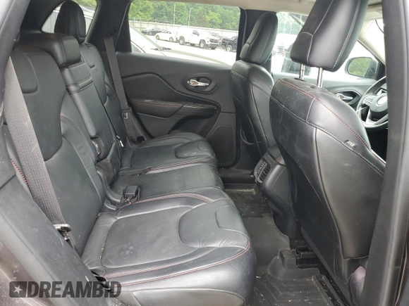 2014 Jeep Cherokee Trailhawk z VIN 1C4PJMBS9EW159721, wystawiony jako Copart lot #60719525 z przebiegiem 136 807 mil mil oraz Szkoda całkowita • Salvage title. Historia ofert i sprzedaży dostępna na DreamBid. Obrazek 11.