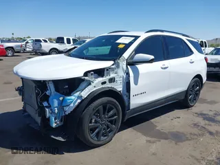 2023 Chevrolet Equinox RS with VIN 3GNAXMEG0PL111407, listed as a IAAI auction lot 41985925 with 34,283 mi miles and . Bid and sale history available at DreamBid. Image 2.