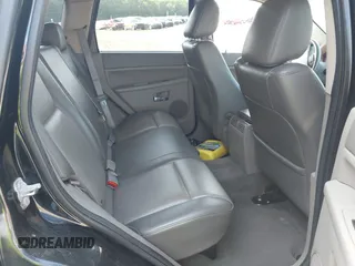 2005 Jeep Grand Cherokee Laredo z VIN 1J4GR48K65C725099, wystawiony jako IAAI lot #42509223 z przebiegiem 249 216 mil mil oraz . Historia ofert i sprzedaży dostępna na DreamBid. Obrazek 8.