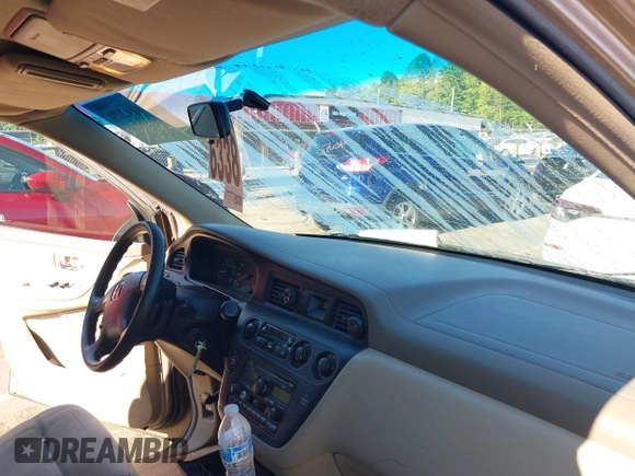 2004 Honda Odyssey EX-L with VIN 5FNRL18044B072819, listed as a IAAI auction lot 42441279 with 264,950 mi miles and . Bid and sale history available at DreamBid. Image 5.