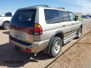 2000 Mitsubishi Montero LS z VIN JA4MT31HXYP020087, wystawiony jako IAAI lot #41540609 z przebiegiem 262 474 mil mil oraz . Historia ofert i sprzedaży dostępna na DreamBid. Obrazek 4.