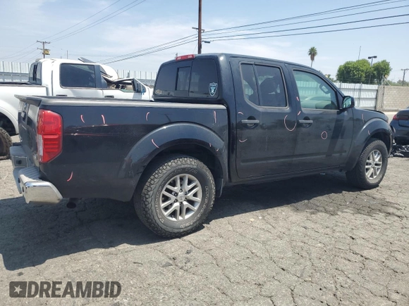 2015 Nissan Frontier SV with VIN 1N6AD0ER4FN767942, listed as a Copart auction lot 60911325 with 118,611 mi miles and Salvage title. Bid and sale history available at DreamBid. Image 3.
