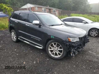 2014 Jeep Grand Cherokee Summit с VIN 1C4RJFJM2EC302534, выставлен на аукционе Copart как лот 61660155 с пробегом 206 823 миль миль и Списание • Salvage title. История ставок и продаж доступна на DreamBid. Изображение 4.