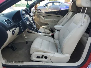 2014 Volkswagen Eos Sport z VIN WVWBW8AH9EV002933, wystawiony jako Copart lot #56212705 z przebiegiem 142 117 mil mil oraz Szkoda całkowita • Salvage title. Historia ofert i sprzedaży dostępna na DreamBid. Obrazek 7.