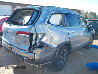 2019 Honda Pilot Touring 7-Passenger with VIN 5FNYF6H60KB038846, listed as a IAAI auction lot 41339385 with Not provided miles and . Bid and sale history available at DreamBid. Image 4.