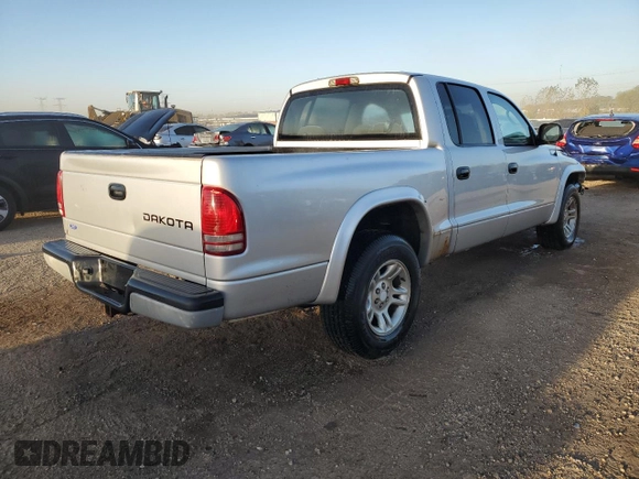 2004 Dodge Dakota Sport with VIN 1D7HL38N24S634602, listed as a Copart auction lot 74386034 with 158,855 mi miles and Salvage Title. Bid and sale history available at carsss.com. Image 3.