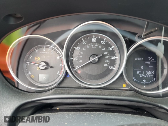 2016 Mazda CX-5 Grand Touring with VIN JM3KE4DY4G0750939, listed as a Copart auction lot 52727395 with 72,428 mi miles and Salvage Title. Bid and sale history available at carsss.com. Image 9.