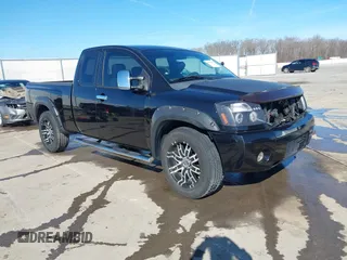 2004 Nissan Titan XE with VIN 1N6AA06A44N563186, listed as a IAAI auction lot 41694608 with Not Provided miles and . Bid and sale history available at DreamBid. Image 1.