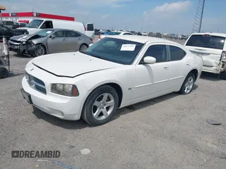 2010 Dodge Charger SXT with VIN 2B3CA3CV0AH165824, listed as a IAAI auction lot 42071499 with 203,013 mi miles. Bid and sale history available at carsss.com. Image 2.