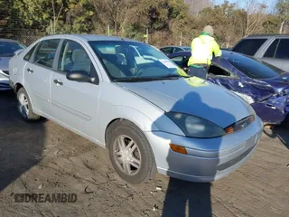 2004 Ford Focus SE with VIN 1FAFP34384W193731, listed as a IAAI auction lot 41380920 with 51,268 mi miles and . Bid and sale history available at DreamBid. Image 1.