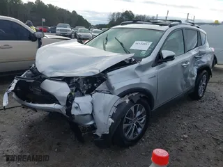 2016 Toyota RAV4 Hybrid XLE with VIN JTMRJREV3GD029654, listed as a IAAI auction lot 41144893 with 73,163 mi miles. Bid and sale history available at carsss.com. Image 20.