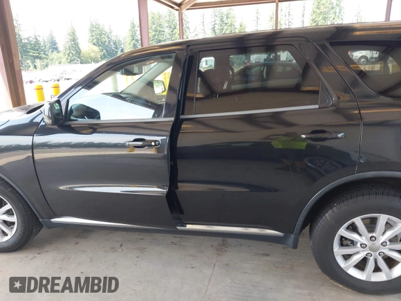 2015 Dodge Durango SXT with VIN 1C4RDHAG5FC113729, listed as a IAAI auction lot 42575337 with 132,618 mi miles and . Bid and sale history available at DreamBid. Image 14.