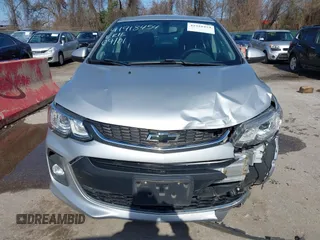 2018 Chevrolet Sonic LT z VIN 1G1JD5SG6J4132523, wystawiony jako IAAI lot #41918454 z przebiegiem 59 332 mil mil oraz . Historia ofert i sprzedaży dostępna na DreamBid. Obrazek 6.