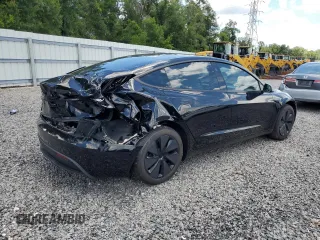2025 Tesla Model 3 Long Range with VIN 5YJ3E1EA8SF984931, listed as a Copart auction lot 61259345 with 2,248 mi miles and Salvage title. Bid and sale history available at DreamBid. Image 3.
