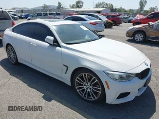 2015 BMW 4 Series 428i z VIN WBA4A9C51FGL86452, wystawiony jako IAAI lot #41960018 z przebiegiem 124 685 mil mil oraz . Historia ofert i sprzedaży dostępna na DreamBid. Obrazek 1.