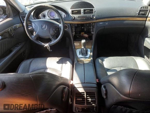 2003 Mercedes-Benz E-Class 5.0L with VIN WDBUF70J53A199951, listed as a Copart auction lot 51138595 with 129,414 mi miles and Salvage Title. Bid and sale history available at carsss.com. Image 8.