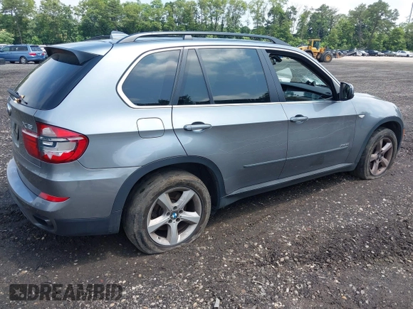 2013 BMW X5 xDrive50i with VIN 5UXZV8C58D0C16717, listed as a IAAI auction lot 42627144 with 165,724 mi miles and . Bid and sale history available at DreamBid. Image 4.