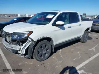 2020 Honda Ridgeline RTL-E with VIN 5FPYK3F76LB005008, listed as a IAAI auction lot 41662580 with 33,987 mi miles. Bid and sale history available at carsss.com. Image 2.