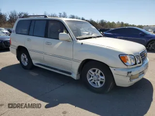 2000 Lexus LX 470 z VIN JT6HT00W1Y0096061, wystawiony jako Copart lot #52499155 z przebiegiem 199 914 mil mil oraz Tytuł czysty. Historia ofert i sprzedaży dostępna na DreamBid. Obrazek 4.