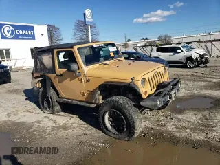 2013 Jeep Wrangler Sport with VIN 1C4AJWAG5DL638636, listed as a Copart auction lot 45197865 with 127,587 mi miles and Salvage title. Bid and sale history available at DreamBid. Image 11.