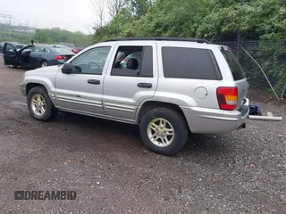2004 Jeep Grand Cherokee Laredo with VIN 1J4GW48N34C145956, listed as a IAAI auction lot 42201114 with 137,815 mi miles and . Bid and sale history available at DreamBid. Image 3.