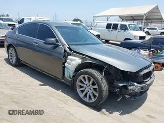 2014 BMW 5 Series 535i xDrive with VIN WBA5B3C57ED531072, listed as a IAAI auction lot 42574991 with 104,304 mi miles and . Bid and sale history available at DreamBid. Image 1.