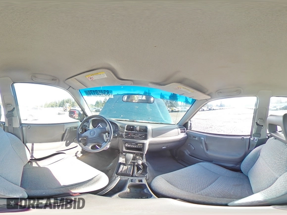 1999 Isuzu Rodeo S with VIN 4S2CM58W7X4359649, listed as a Copart auction lot 83450174 with 171,940 mi miles and Salvage title. Bid and sale history available at DreamBid. Image 12.