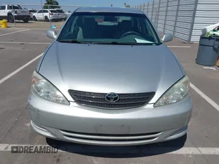 2004 Toyota Camry LE with VIN 4T1BE32K74U300025, listed as a IAAI auction lot 42035954 with 115,203 mi miles. Bid and sale history available at carsss.com. Image 12.