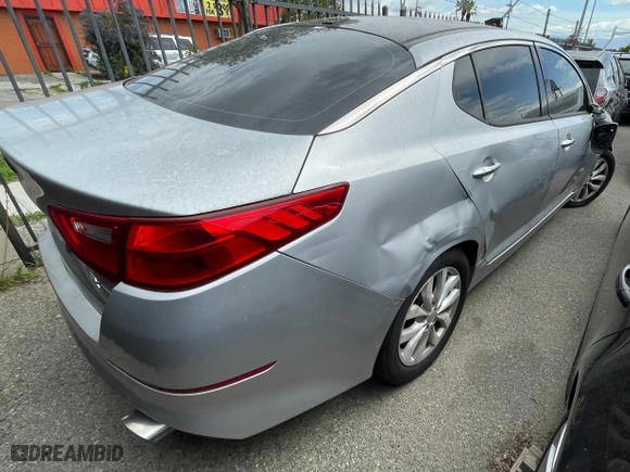 2014 Kia Optima EX with VIN 5XXGN4A70EG303904, listed as a Copart auction lot 51712855 with 1 mi miles and Clean Title. Bid and sale history available at carsss.com. Image 4.
