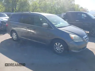 2007 Honda Odyssey EX-L with VIN 5FNRL38777B140916, listed as a IAAI auction lot 42159976 with 167,541 mi miles. Bid and sale history available at carsss.com. Image 1.