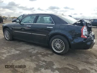 2009 Chrysler 300 with VIN 2C3LK33V19H614083, listed as a Copart auction lot 77529014 with 188,125 mi miles and Salvage title. Bid and sale history available at DreamBid. Image 2.