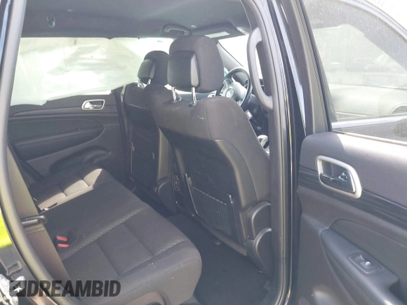 2021 Jeep Grand Cherokee Laredo X with VIN 1C4RJFAG7MC502866, listed as a IAAI auction lot 41841328 with 59,870 mi miles and . Bid and sale history available at DreamBid. Image 8.