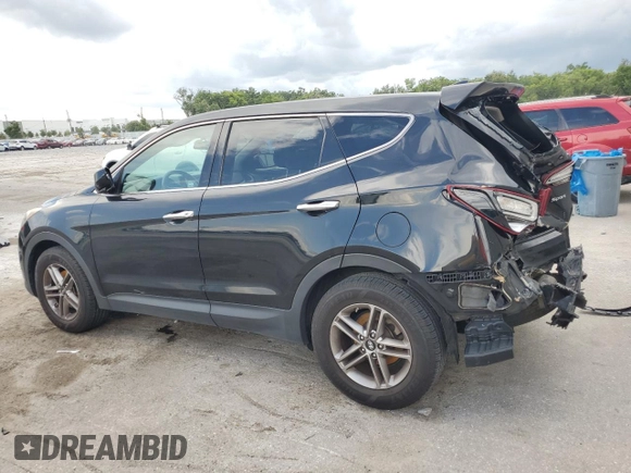 2017 Hyundai Santa Fe 2.4L z VIN 5NMZT3LB6HH040009, wystawiony jako Copart lot #58953685 z przebiegiem 161 455 mil mil oraz Szkoda całkowita • Salvage title. Historia ofert i sprzedaży dostępna na DreamBid. Obrazek 2.