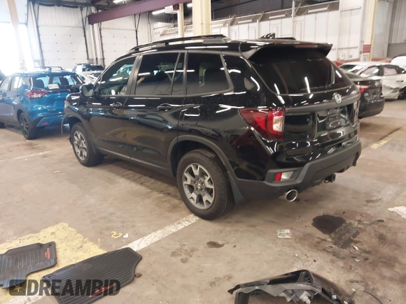 2023 Honda Passport TrailSport with VIN 5FNYF8H64PB016819, listed as a IAAI auction lot 41997402 with 22,106 mi miles and . Bid and sale history available at DreamBid. Image 3.